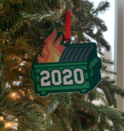 Pretty accurate "An ornament on a Christmas tree which is a cartoon garbage dumpster on fire with '2020' superimposed on it"